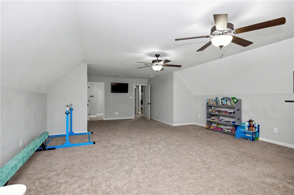 92 Gordon Oaks Way Moreland, GA 30259 - Photo 32 of 54 a view of empty room with ceiling fan