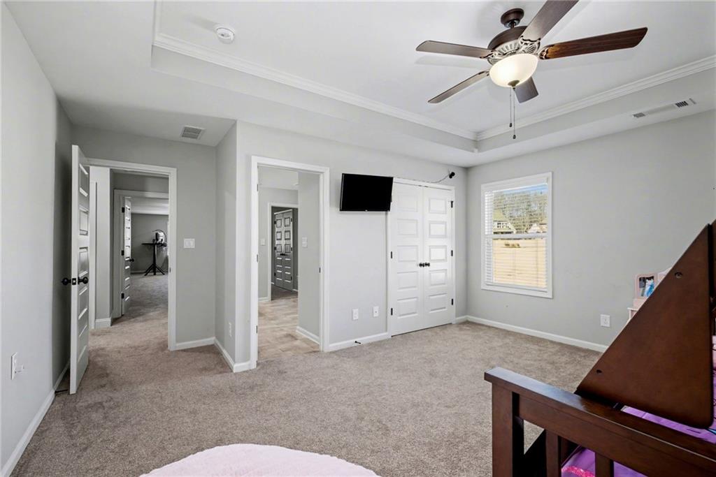 92 Gordon Oaks Way Moreland, GA 30259 - Photo 38 of 54 a living room with furniture and a ceiling fan