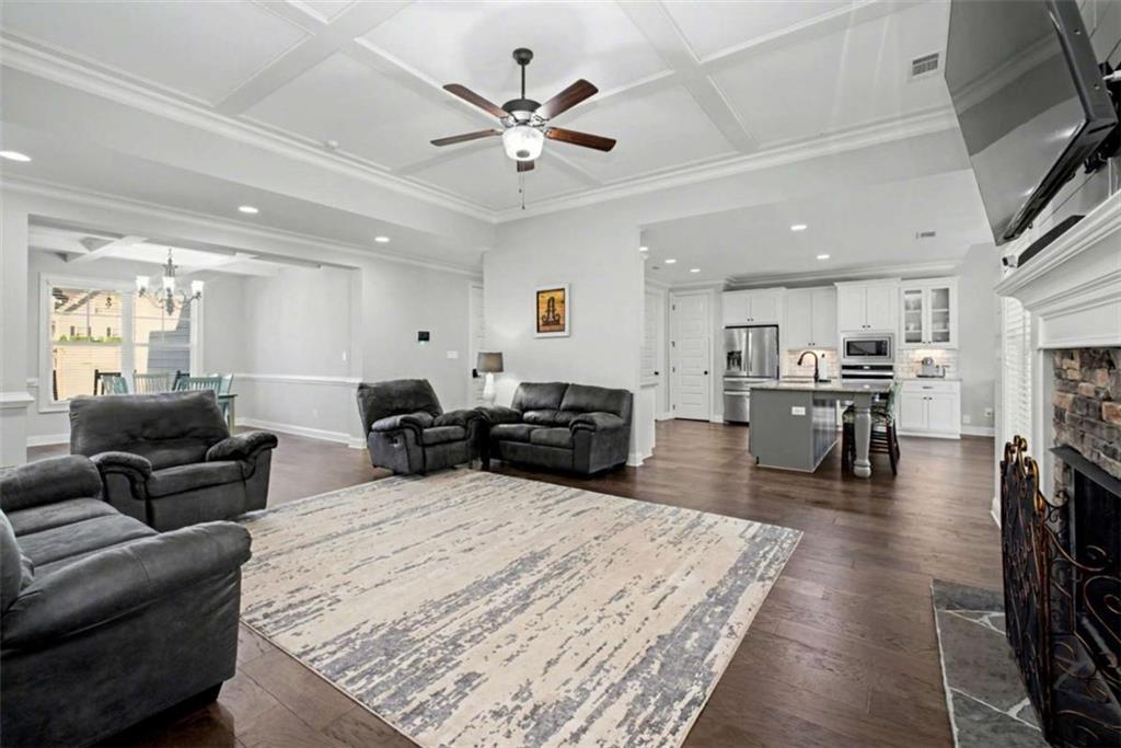 92 Gordon Oaks Way Moreland, GA 30259 - Photo 8 of 54 a living room with furniture and kitchen view