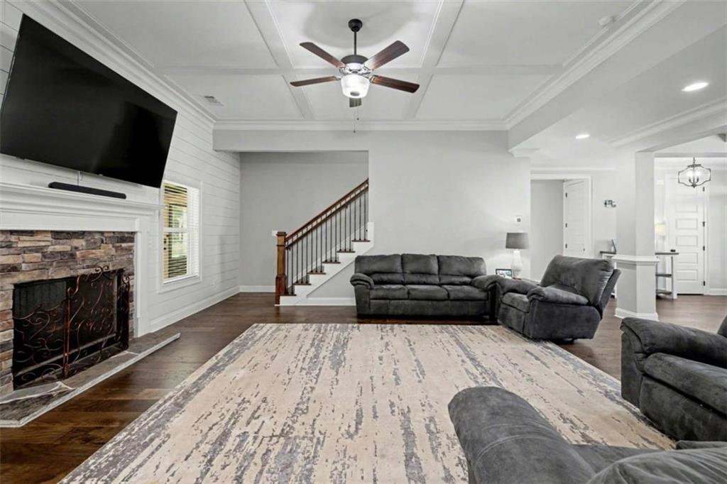 92 Gordon Oaks Way Moreland, GA 30259 - Photo 10 of 54 a living room with furniture and a fireplace
