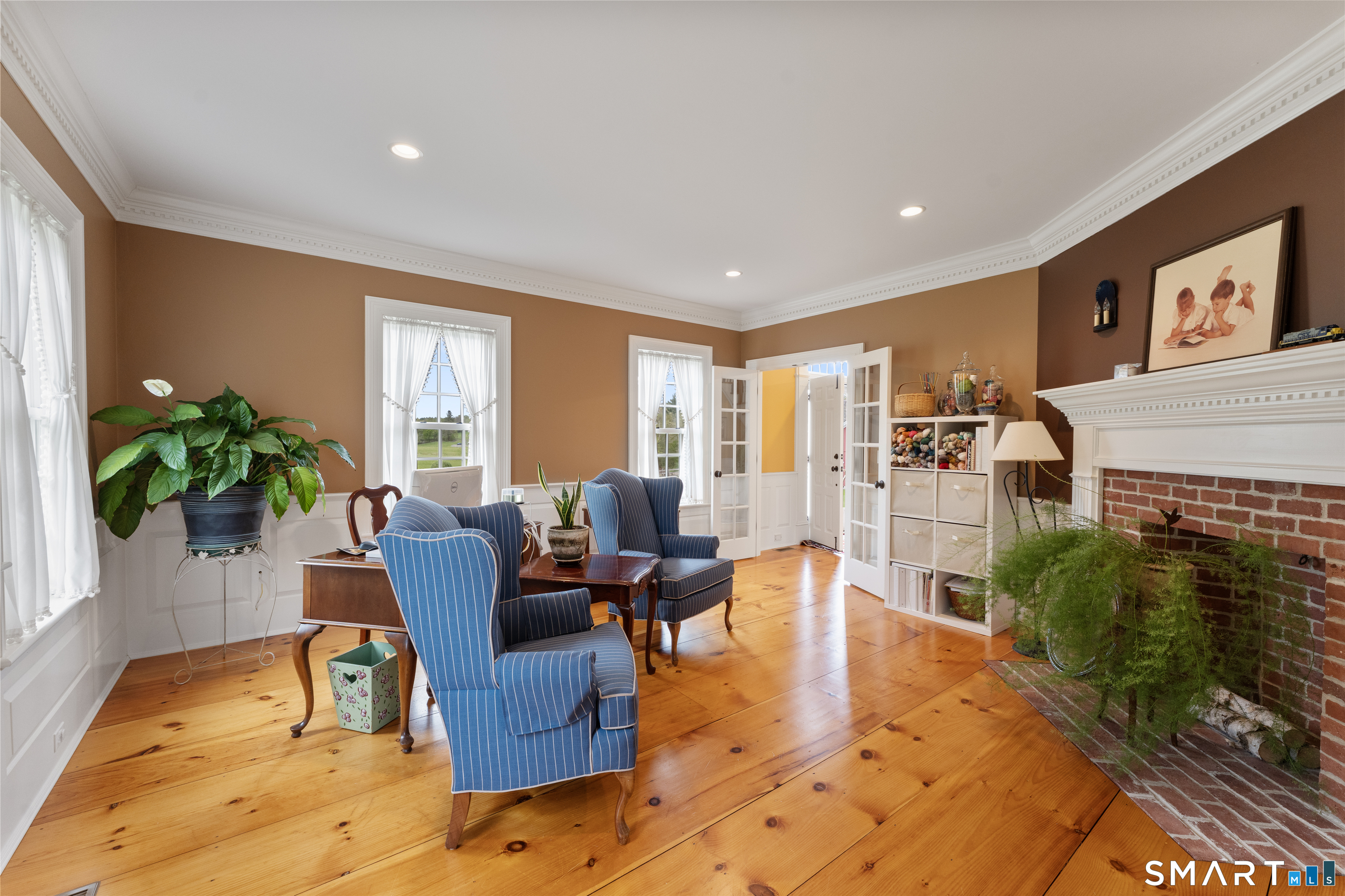 155 Paine Road Woodstock, CT 06281 - Photo 11 of 40 a living room with furniture window and wooden floor