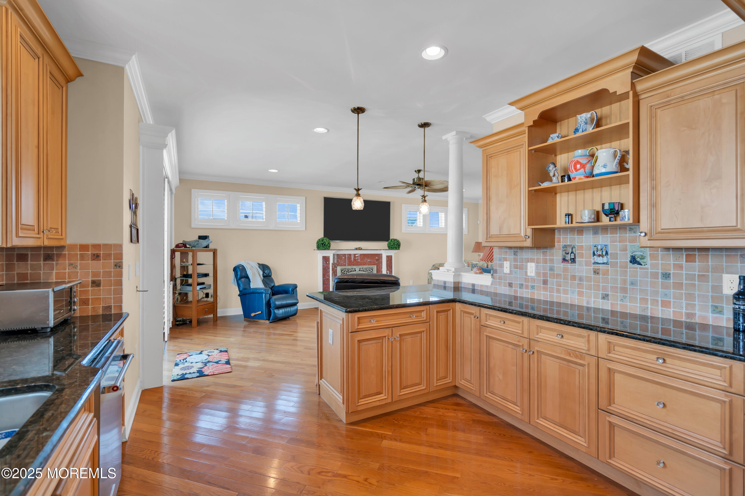 106 2nd Avenue Belmar, NJ 07719 - Photo 13 of 42 a kitchen with stainless steel appliances granite countertop a stove and a sink