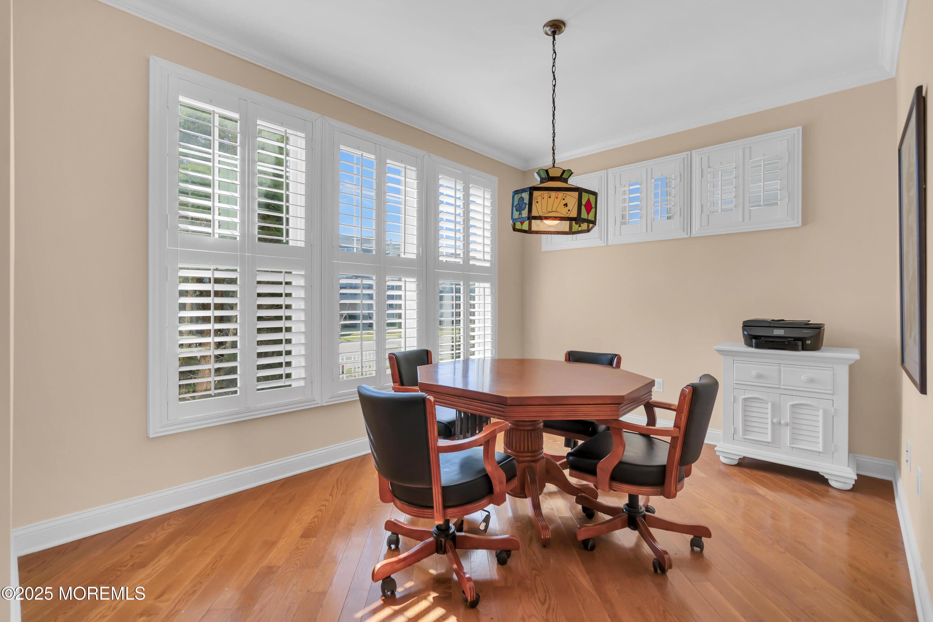 106 2nd Avenue Belmar, NJ 07719 - Photo 14 of 42 a view of a dining room with furniture window and wooden floor