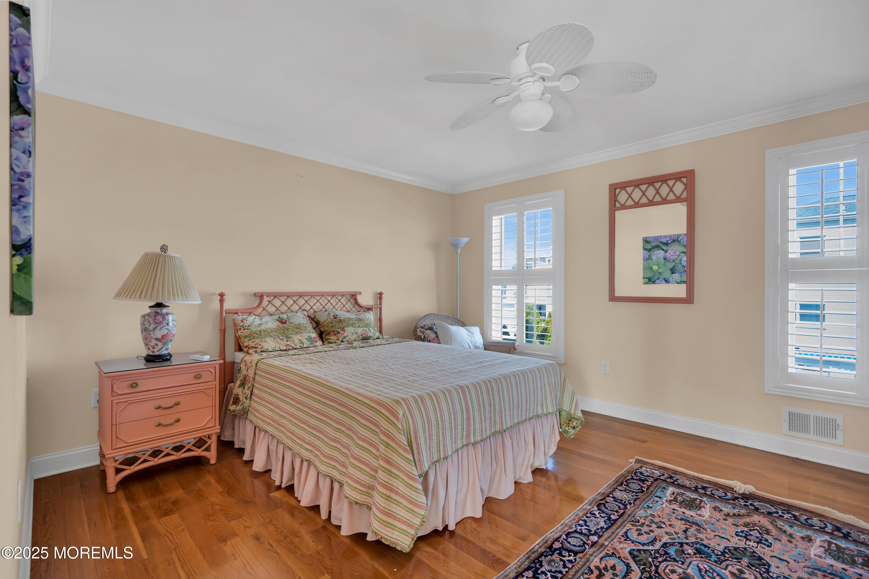 106 2nd Avenue Belmar, NJ 07719 - Photo 17 of 42 a bedroom with a bed and a window