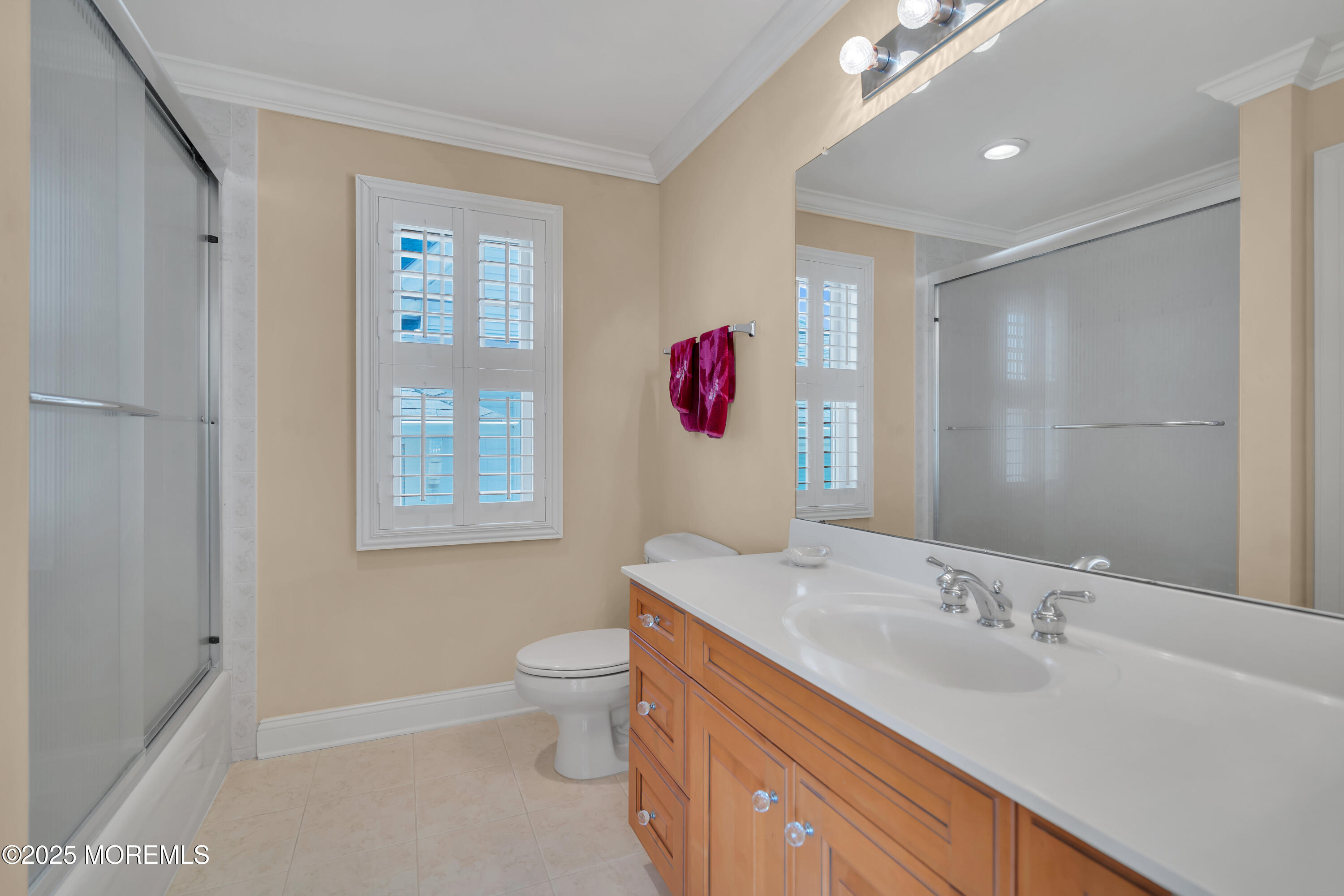 106 2nd Avenue Belmar, NJ 07719 - Photo 18 of 42 a bathroom with a sink and a mirror