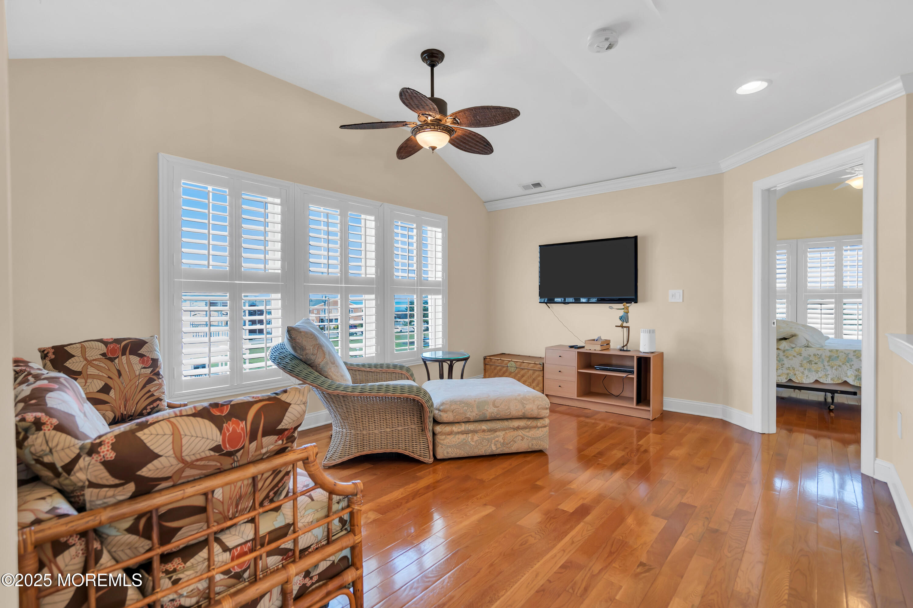 106 2nd Avenue Belmar, NJ 07719 - Photo 35 of 42 a living room with furniture and a flat screen tv