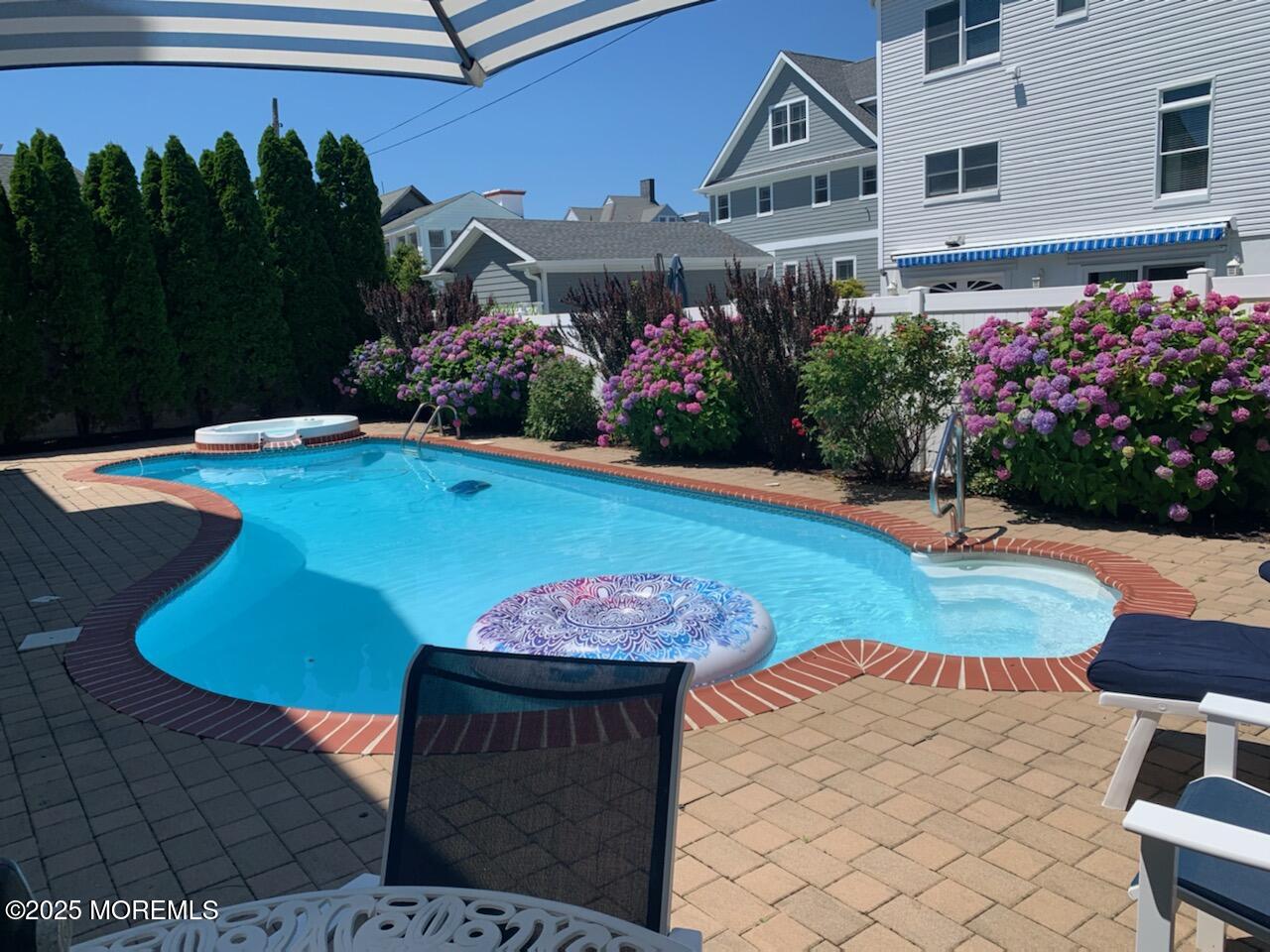 106 2nd Avenue Belmar, NJ 07719 - Photo 37 of 42 a view of a backyard with plants