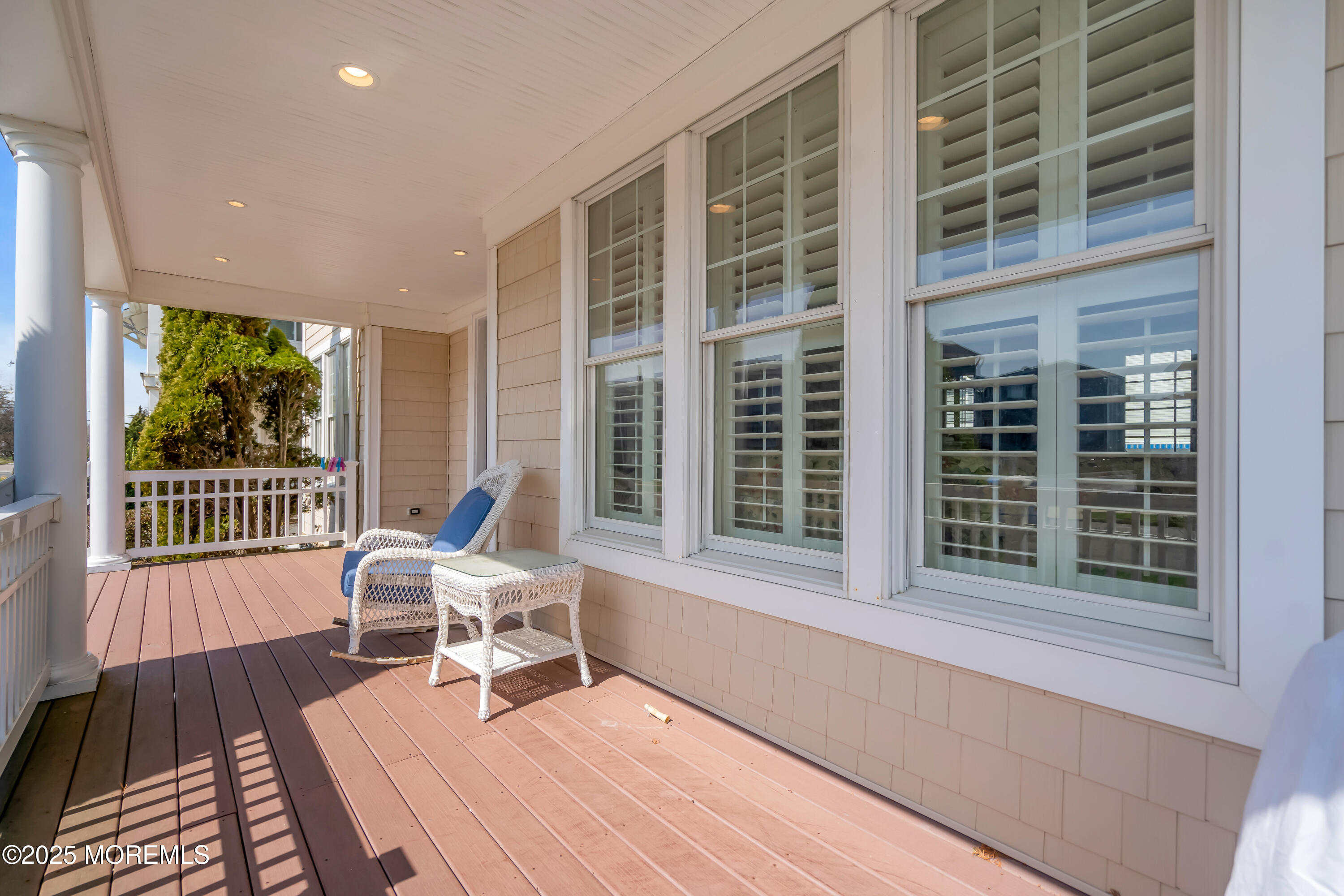 106 2nd Avenue Belmar, NJ 07719 - Photo 4 of 42 a view of a roof deck with chair and wooden floor