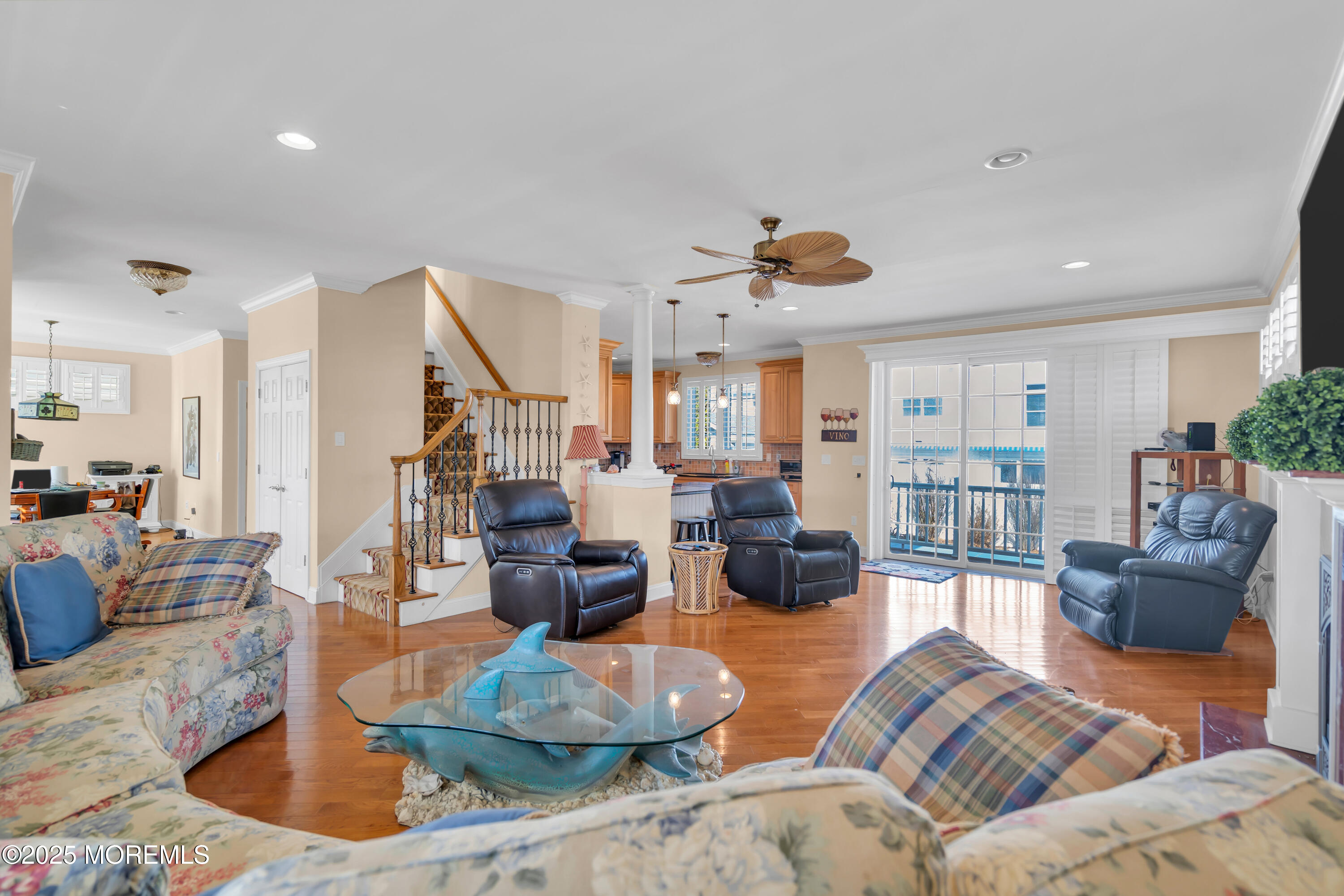 106 2nd Avenue Belmar, NJ 07719 - Photo 9 of 42 a living room with furniture kitchen view and a wooden floor
