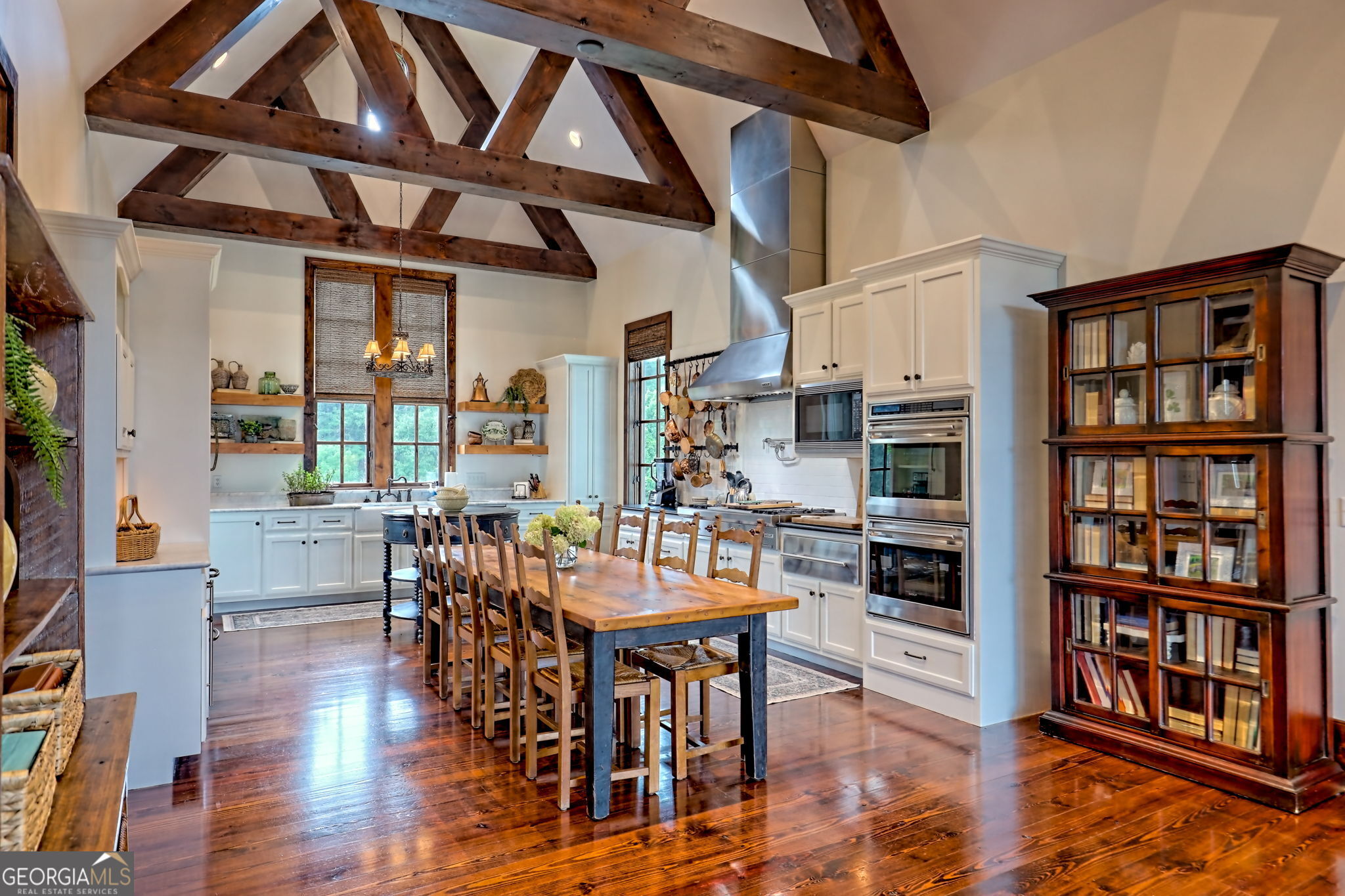 3662 Blue Ridge Gap Road Clayton, GA 30525 - Photo 13 of 69 a view of a dining room with furniture and wooden floor
