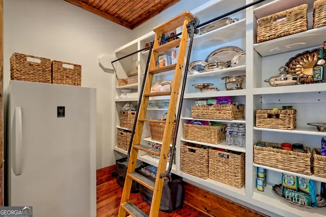 a living room with chairs