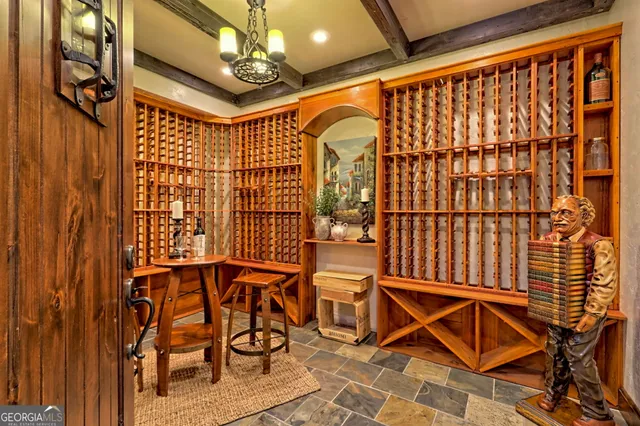 a kitchen with a stove a sink and a wooden cabinets