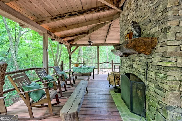 a bedroom with furniture and wooden floor
