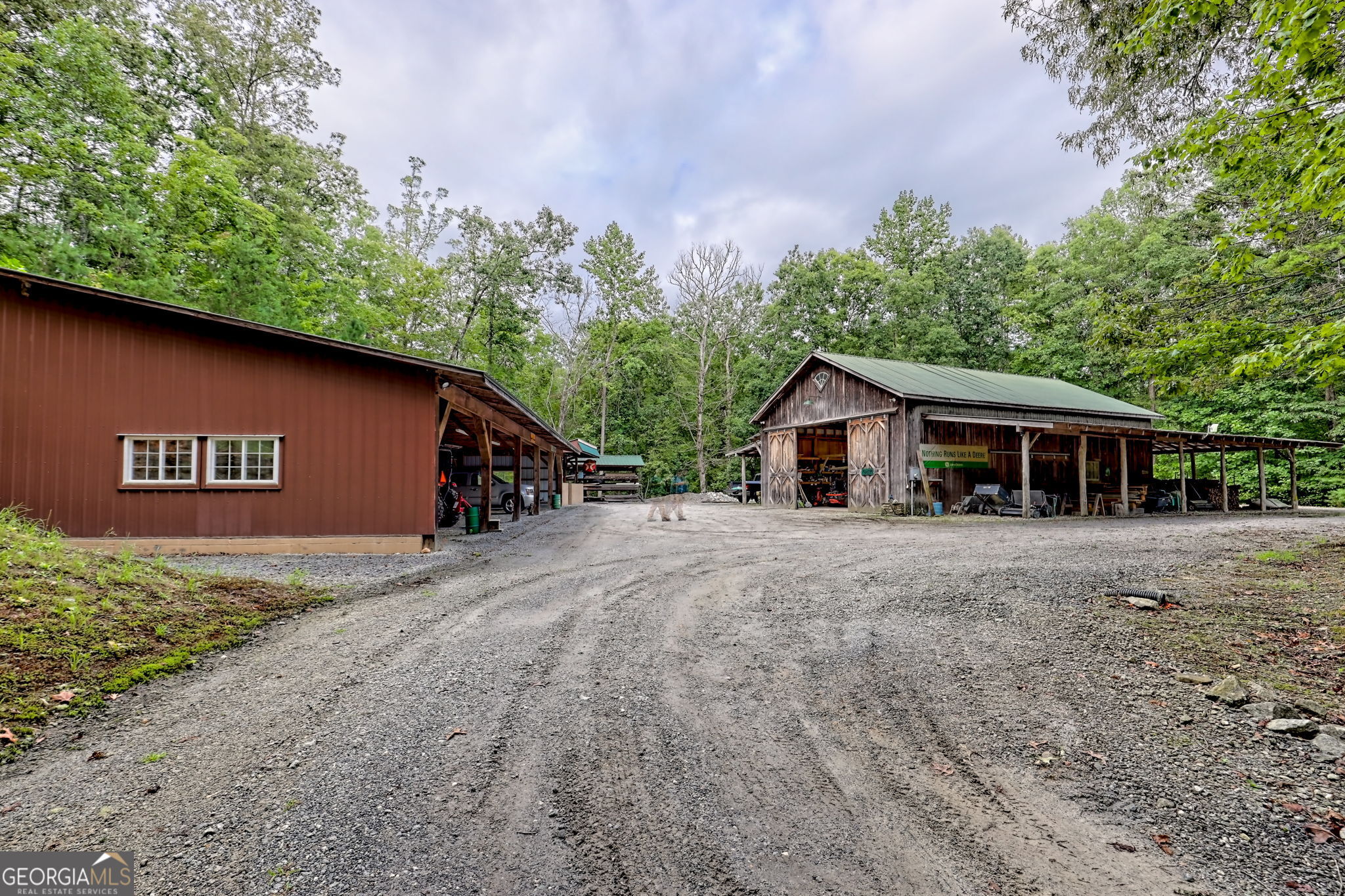 3662 Blue Ridge Gap Road Clayton, GA 30525 - Photo 67 of 69 a front view of house with yard and trees in the background