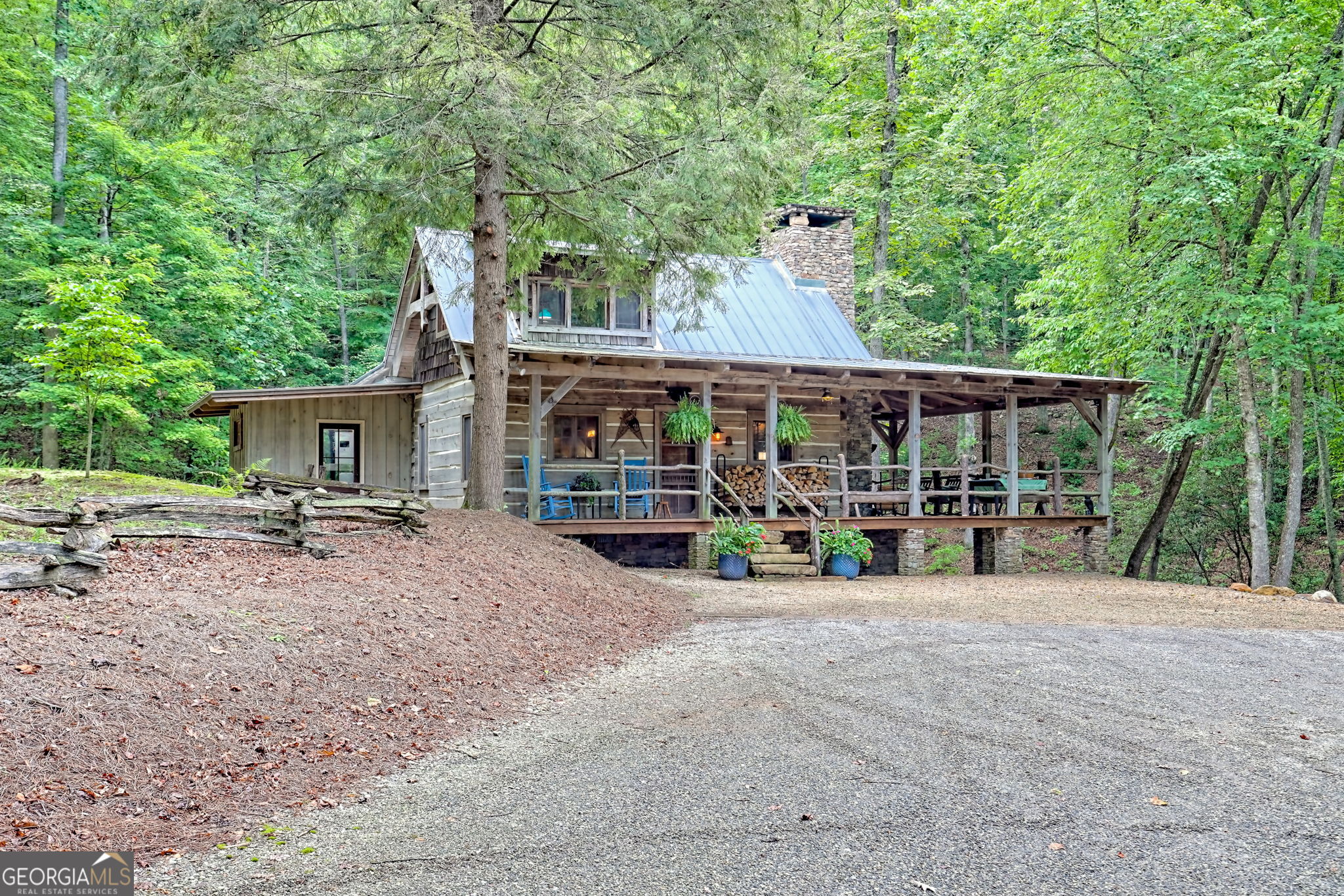 3662 Blue Ridge Gap Road Clayton, GA 30525 - Photo 68 of 69 a view of a house with a porch and sitting area