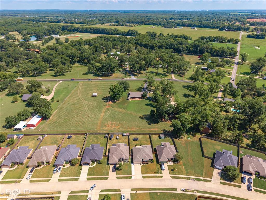 4938 Swan Lake Road Bossier City, LA 71111 - Photo 10 of 17 an aerial view of residential houses with outdoor space and seating space