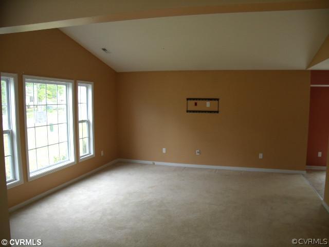 11563 Oakrise Road New Kent, VA 23124 - Photo 4 of 12 Living Room - There is a vaulted ceiling in the li
