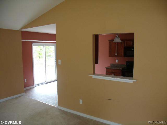 11563 Oakrise Road New Kent, VA 23124 - Photo 5 of 12 Living Room - There is a window opening from the l