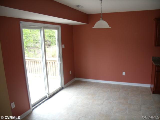 11563 Oakrise Road New Kent, VA 23124 - Photo 6 of 12 Dining Room - The dining area has direct access to