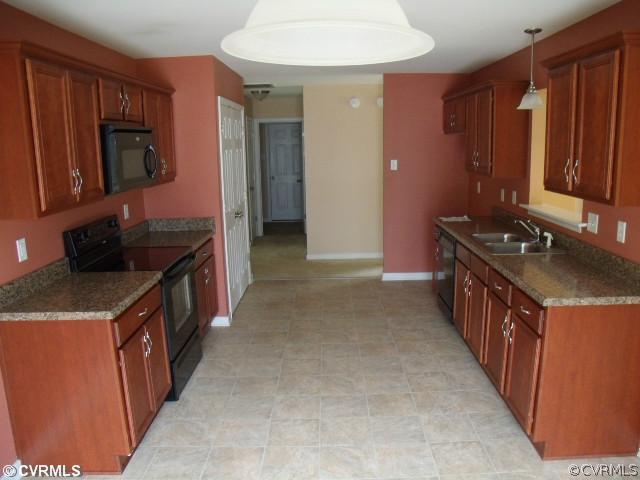 11563 Oakrise Road New Kent, VA 23124 - Photo 7 of 12 Kitchen - The kitchen is open and features a built