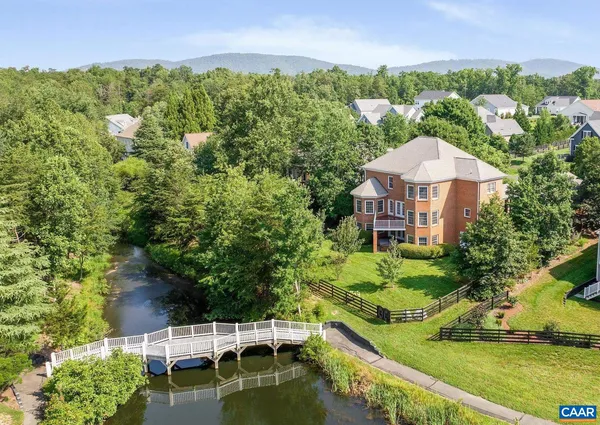 an aerial view of a house with a garden