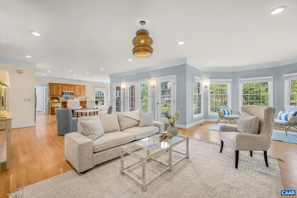 a kitchen with stainless steel appliances granite countertop a refrigerator stove microwave and sink