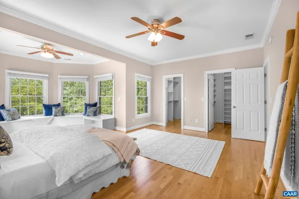 a view of a livingroom with an empty room and window