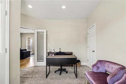 a room with furniture and a chair