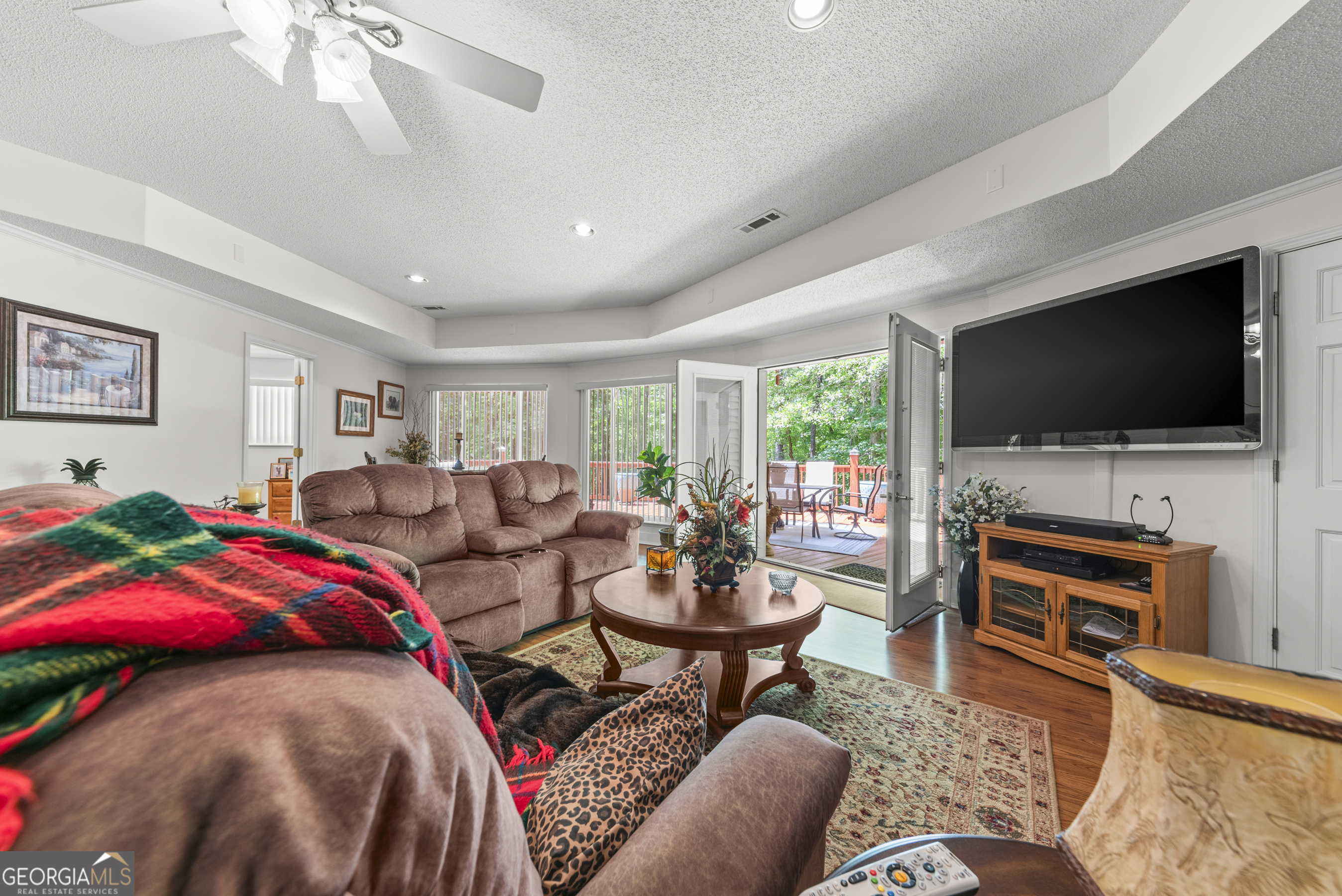 1170 Cedar Grove Road Buckhead, GA 30625 - Photo 26 of 51 a living room with furniture and a flat screen tv