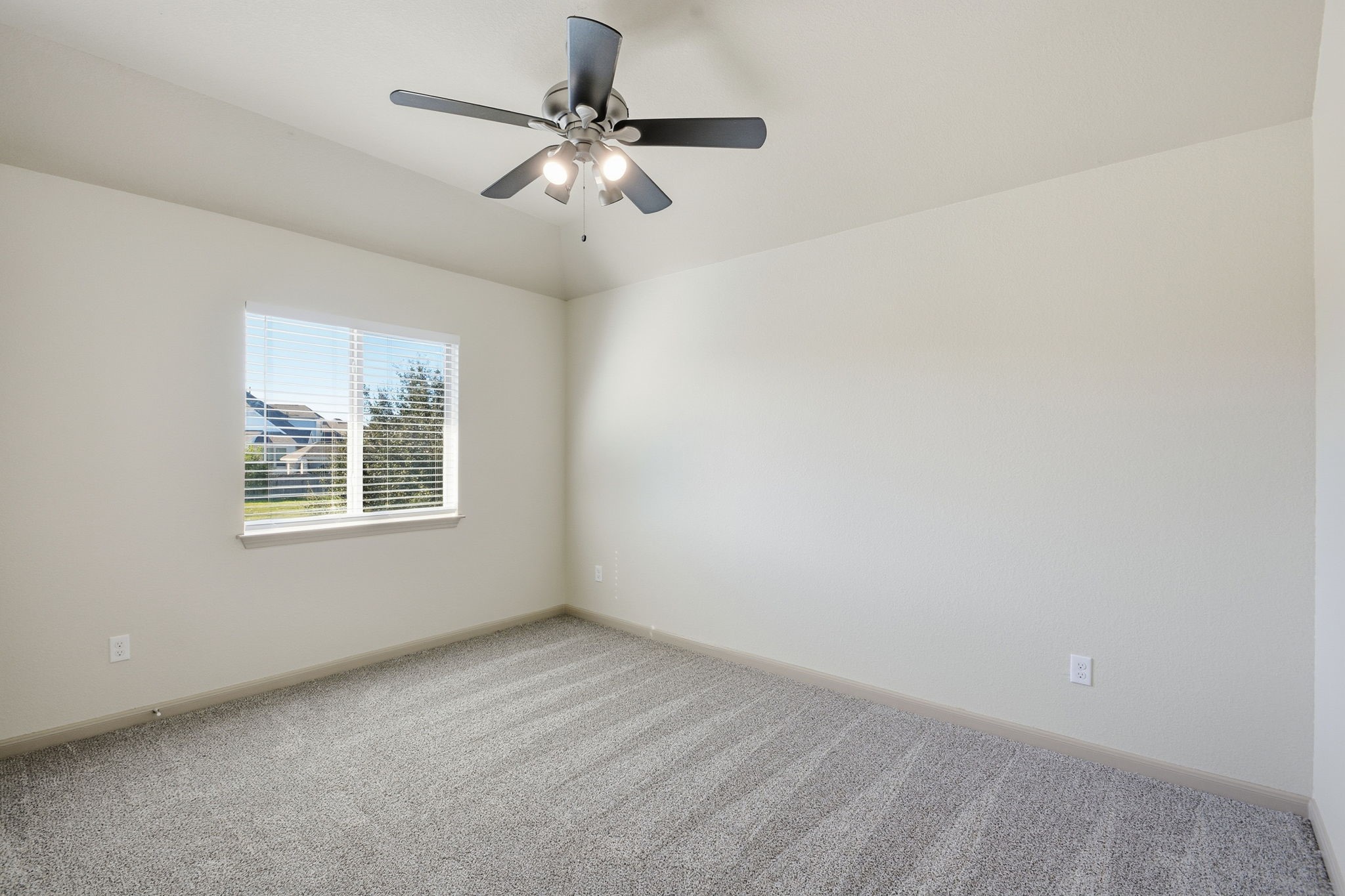 25523 Marmite Drive Tomball, TX 77375 - Photo 39 of 50 an empty room with a window