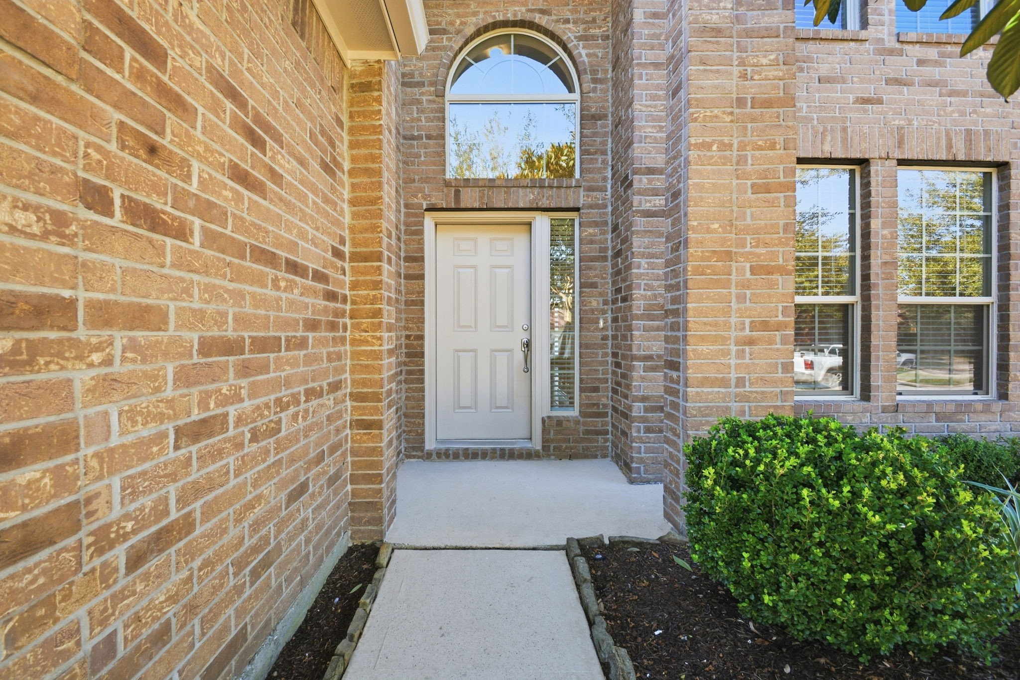 25523 Marmite Drive Tomball, TX 77375 - Photo 4 of 50 a view of a brick house with a door