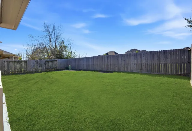 a house view with a garden space