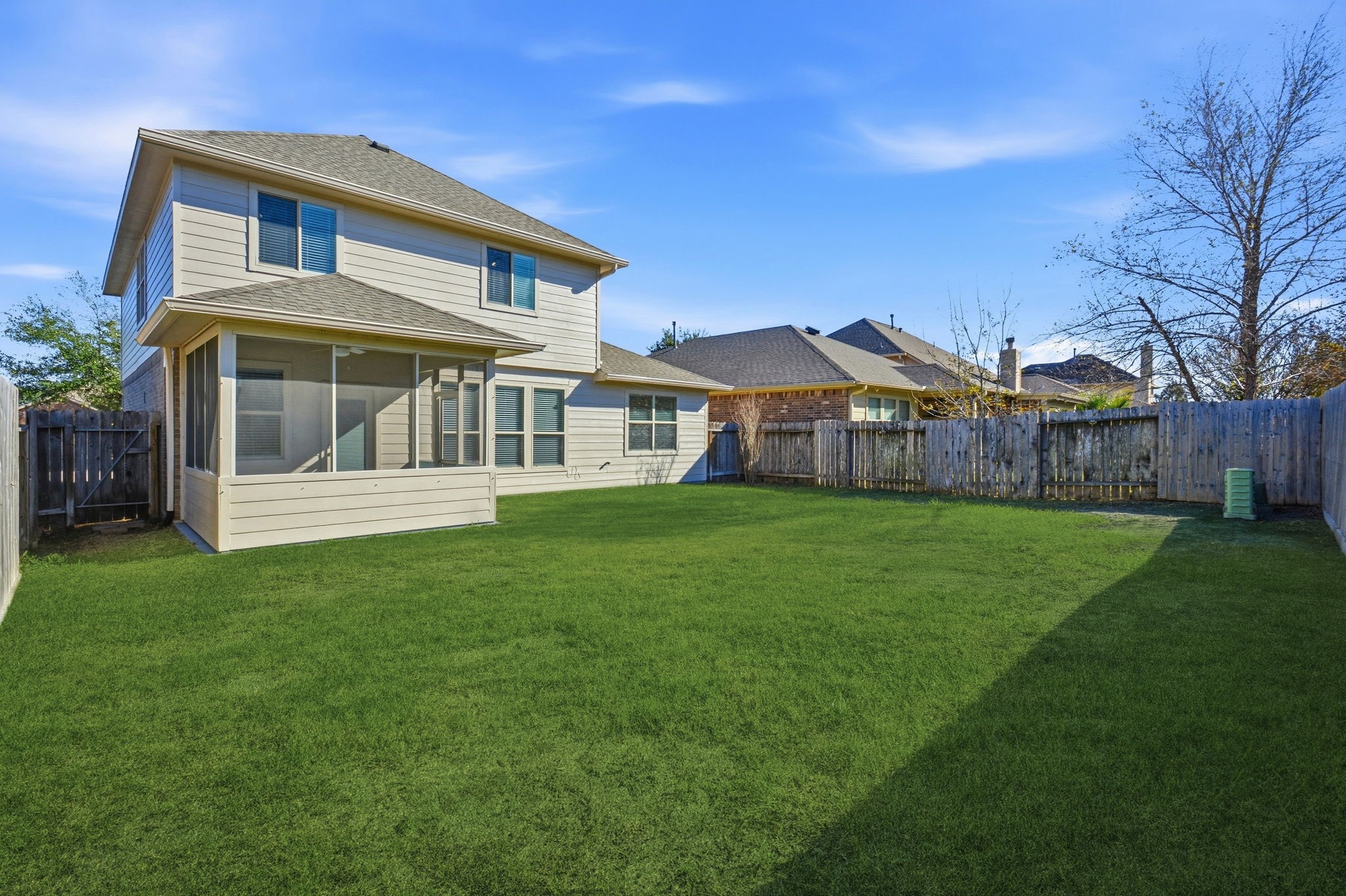 25523 Marmite Drive Tomball, TX 77375 - Photo 49 of 50 a view of a big house with a big yard and large trees