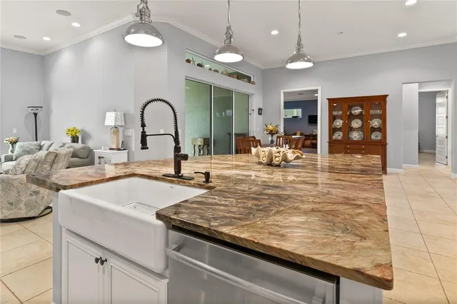 a bedroom with a large bed and a balcony