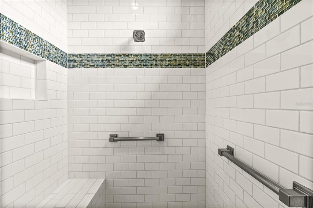 8065 Bridgeport Bay Circle Mount Dora, FL 32757 - Photo 25 of 60 a bathroom with a shower