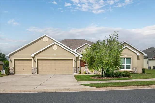 a view of a lake with a garden and lake view