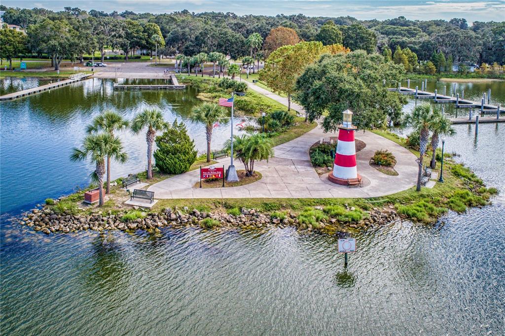 8065 Bridgeport Bay Circle Mount Dora, FL 32757 - Photo 56 of 60 an aerial view of a house with a yard table and chairs