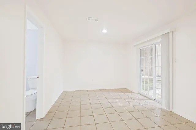a bathroom with a sink a mirror and a shower