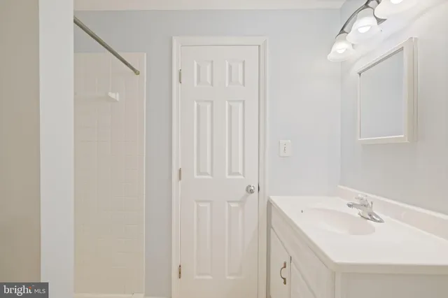 a front view of a house with garden and porch