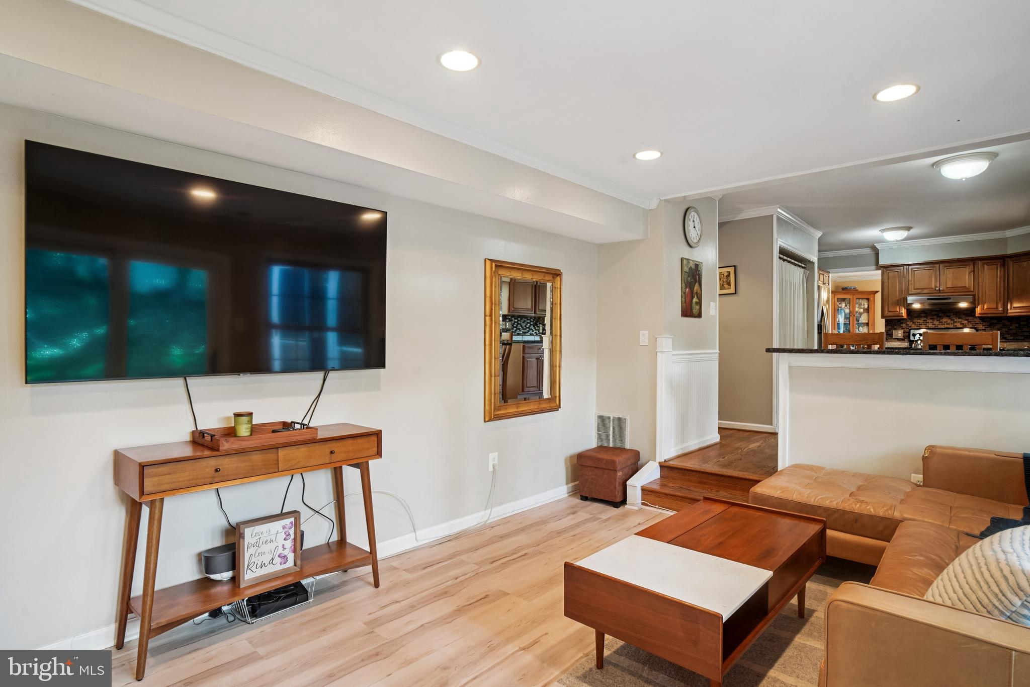 10408 Windfall Court Damascus, MD 20872 - Photo 11 of 38 a living room with furniture and wooden floor