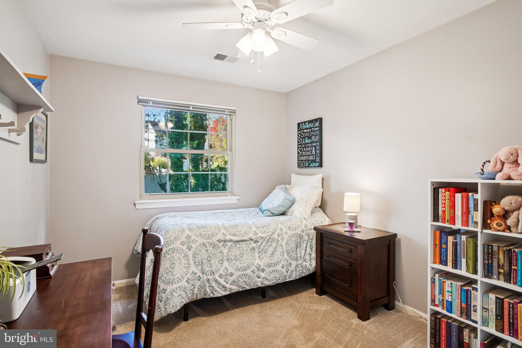 10408 Windfall Court Damascus, MD 20872 - Photo 20 of 38 a bedroom with a bed furniture and a book shelf