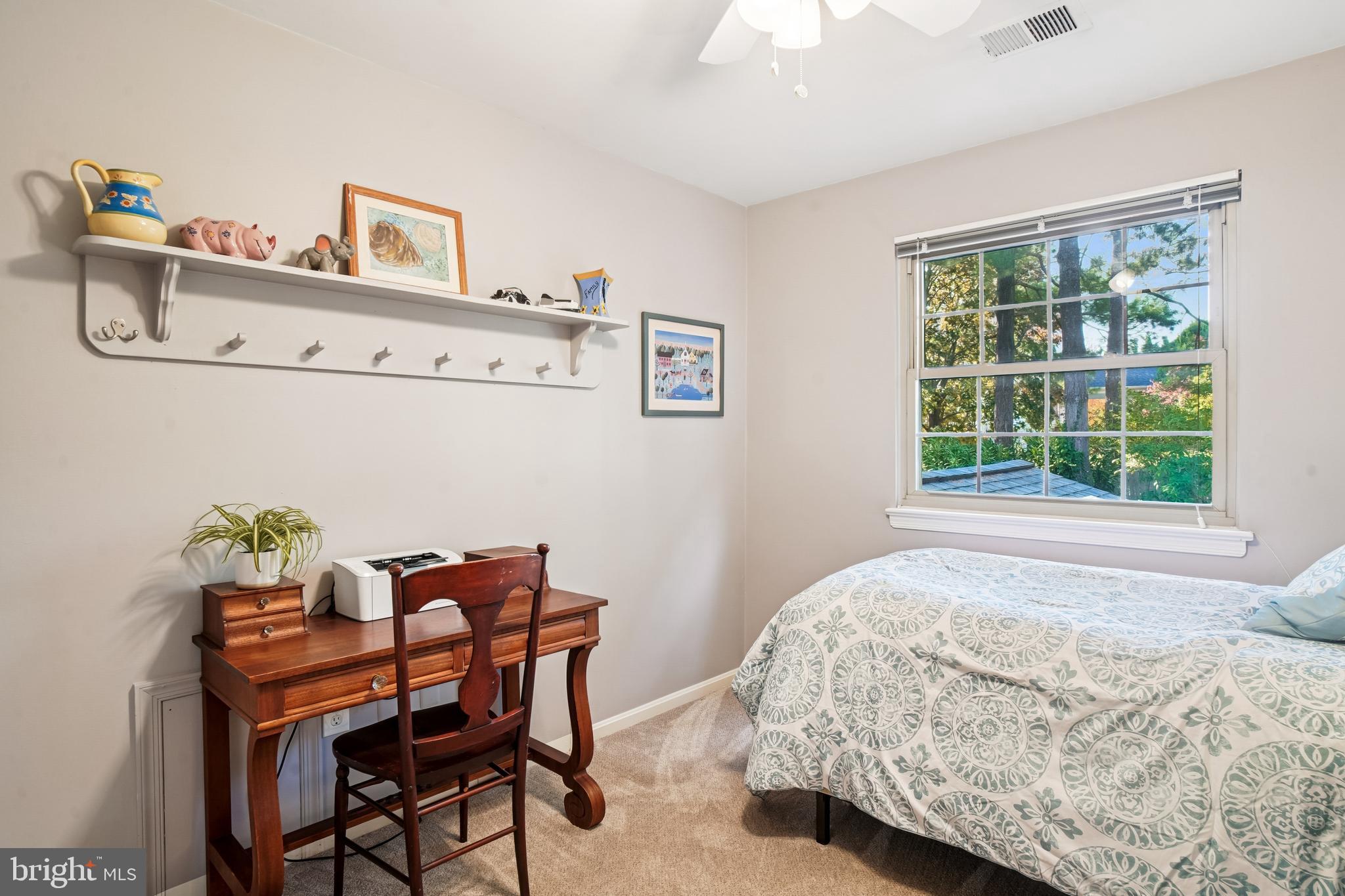 10408 Windfall Court Damascus, MD 20872 - Photo 21 of 38 a bedroom with a bed and a window
