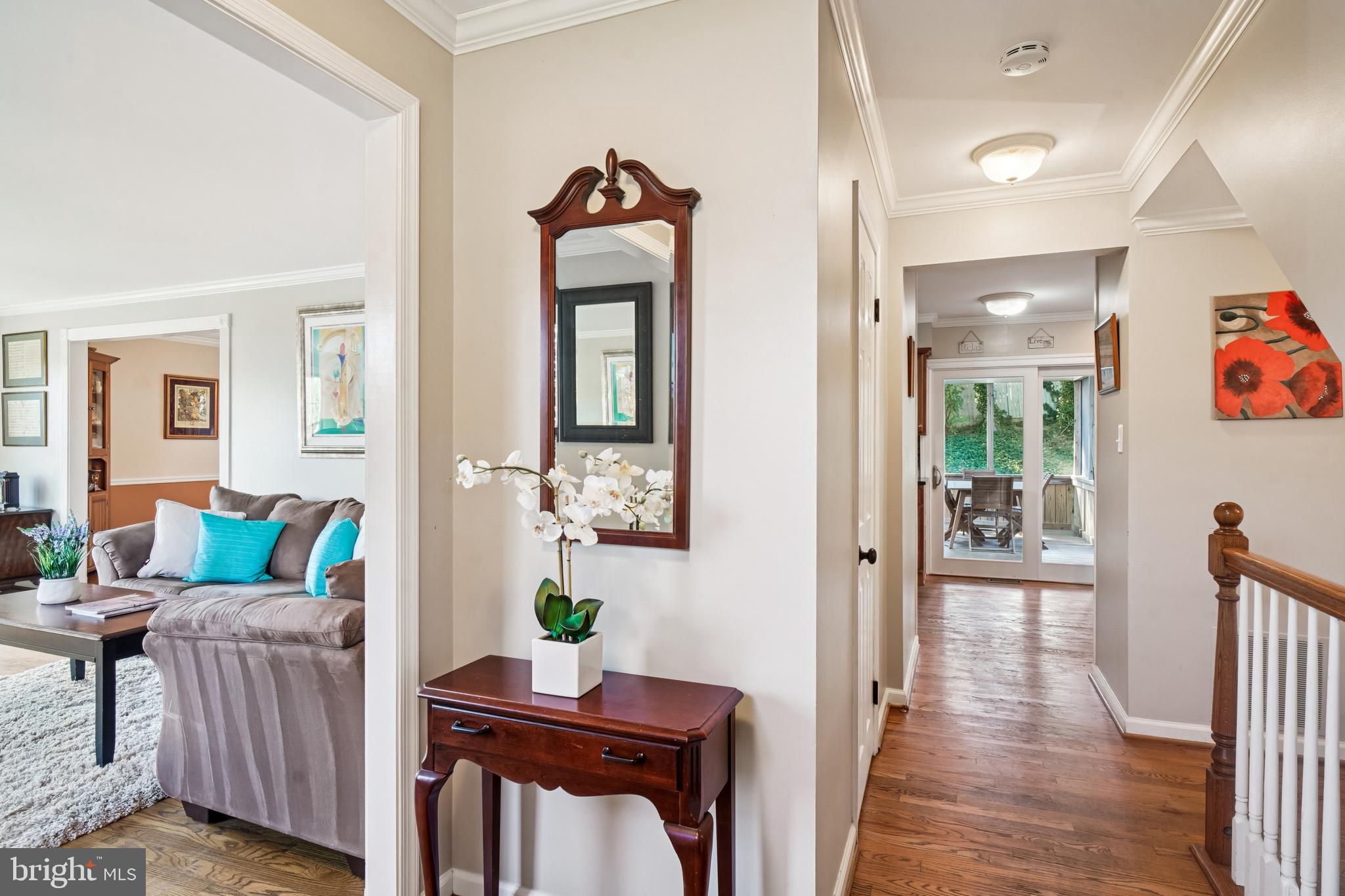 10408 Windfall Court Damascus, MD 20872 - Photo 3 of 38 a living room with furniture and a wooden floor