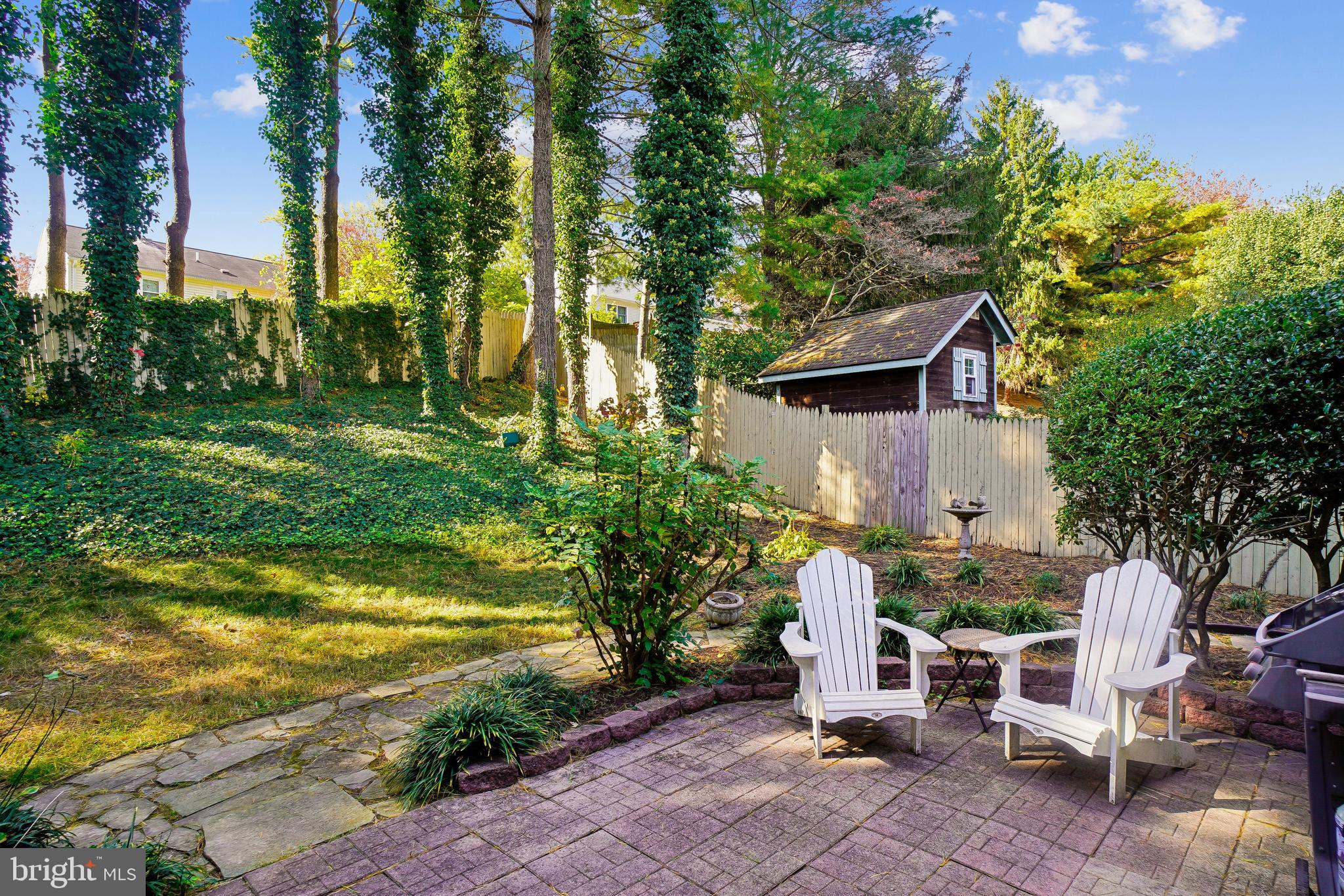 10408 Windfall Court Damascus, MD 20872 - Photo 34 of 38 a front view of a house with garden