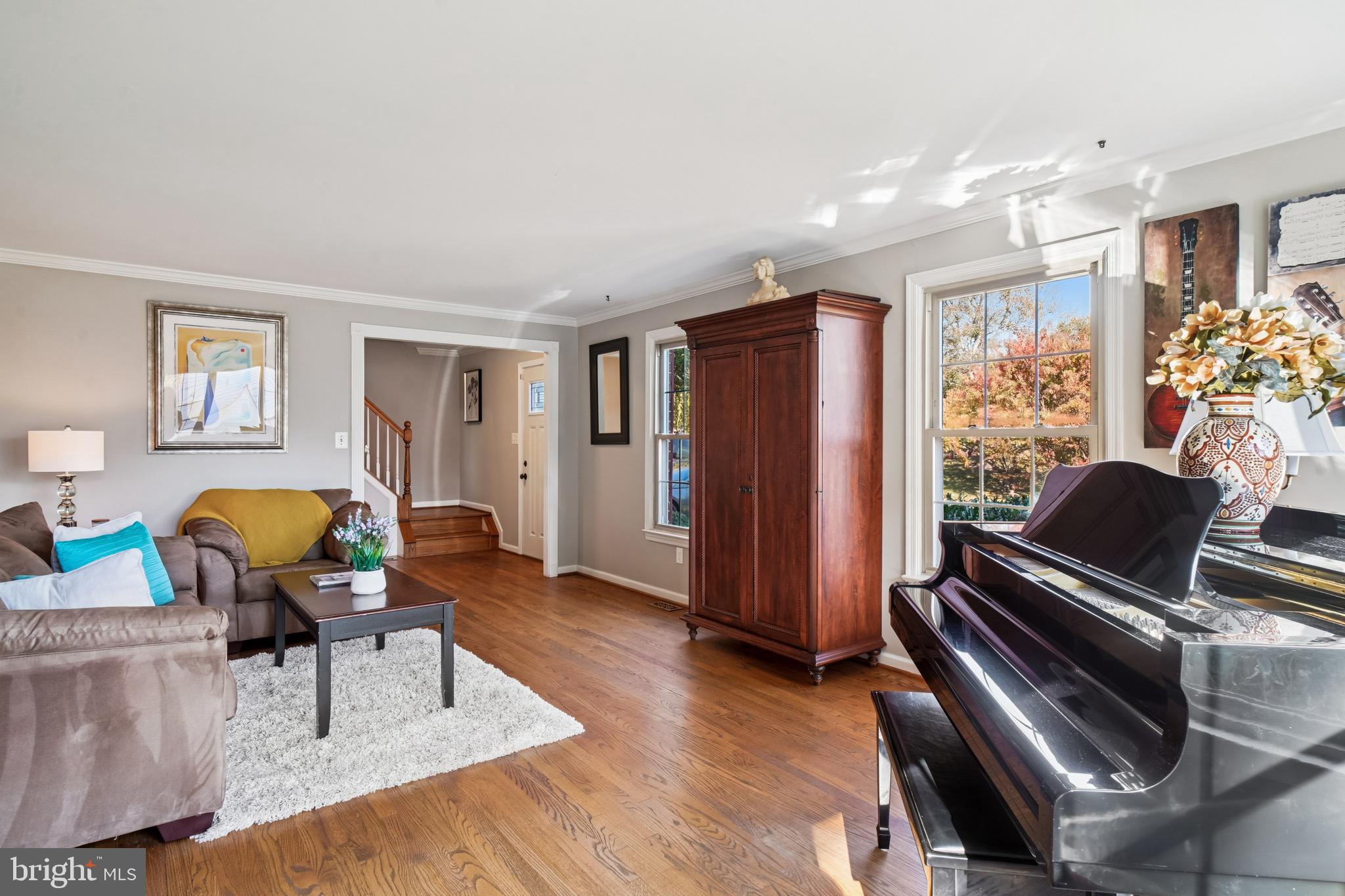 10408 Windfall Court Damascus, MD 20872 - Photo 5 of 38 a living room with furniture gym equipment and a window