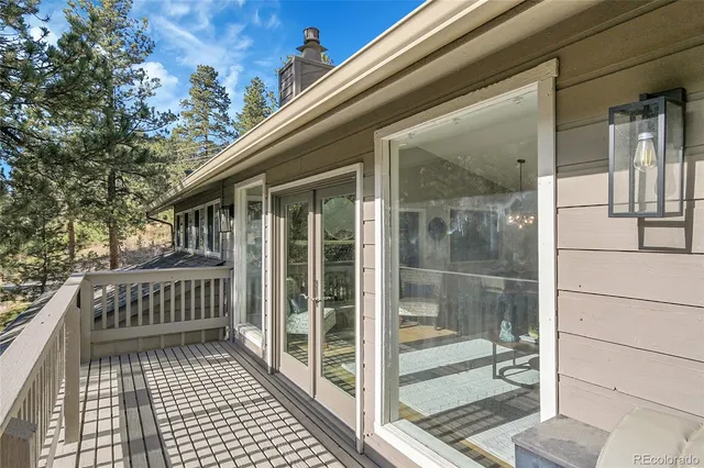 a view of a chairs and table on the wooden floor