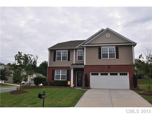 1156 Spicewood Pines Road Fort Mill, SC 29708 - Photo 2 of 16 a front view of a house with a yard