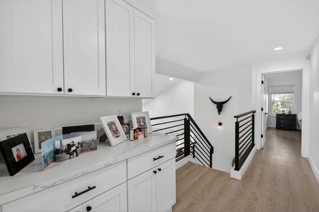 a bedroom with a bed and a table in it