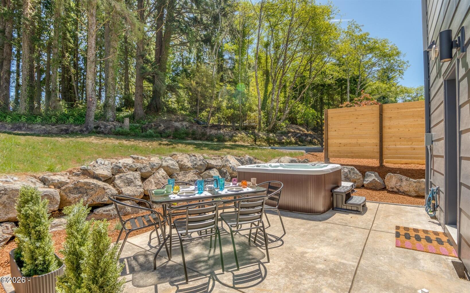 500 Southeast Shell Avenue Depoe Bay, OR 97341 - Photo 23 of 33 Privacy screened patio for relaxing in the hot tub.
