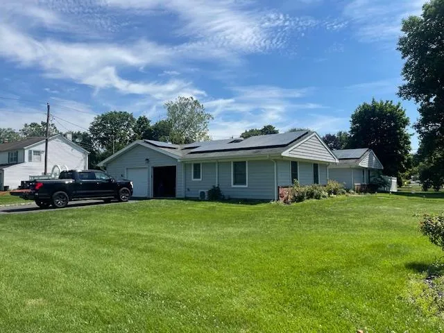 a view of a house with a garden